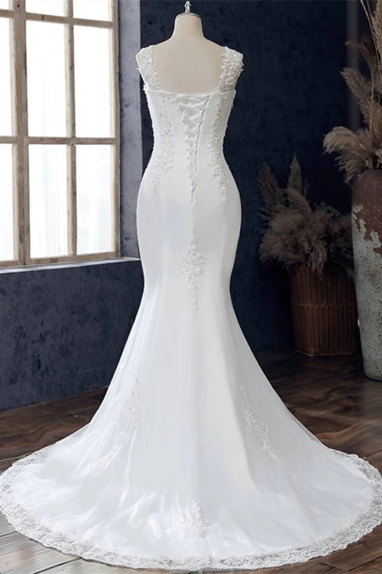 Robe de mariée trompette sans manches à col rond et dentelle